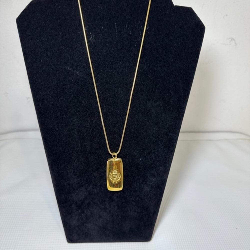Gold Pendant Necklace with Engraved Emblem